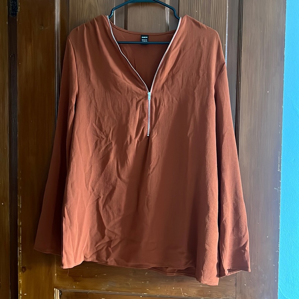 Rust colored blouse